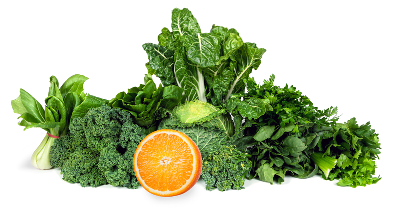 Leafy greens and an orange, some of the best foods to improve immunity